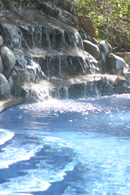 Poool and waterfall at montezuma beach houses