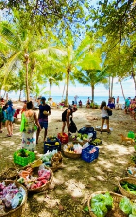 shoppers and veggies at the Saturday Market