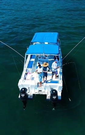 men on boat sport fishing