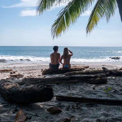 couple sitting at Manchas beach